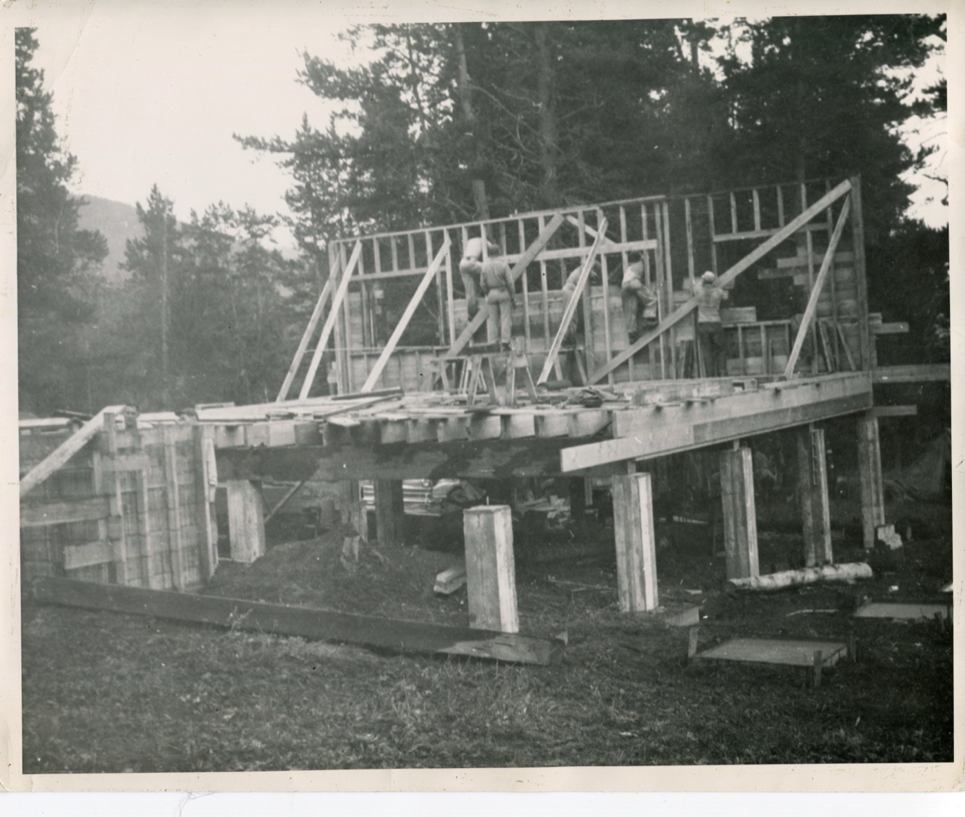 Four men building the new lodge, 1947